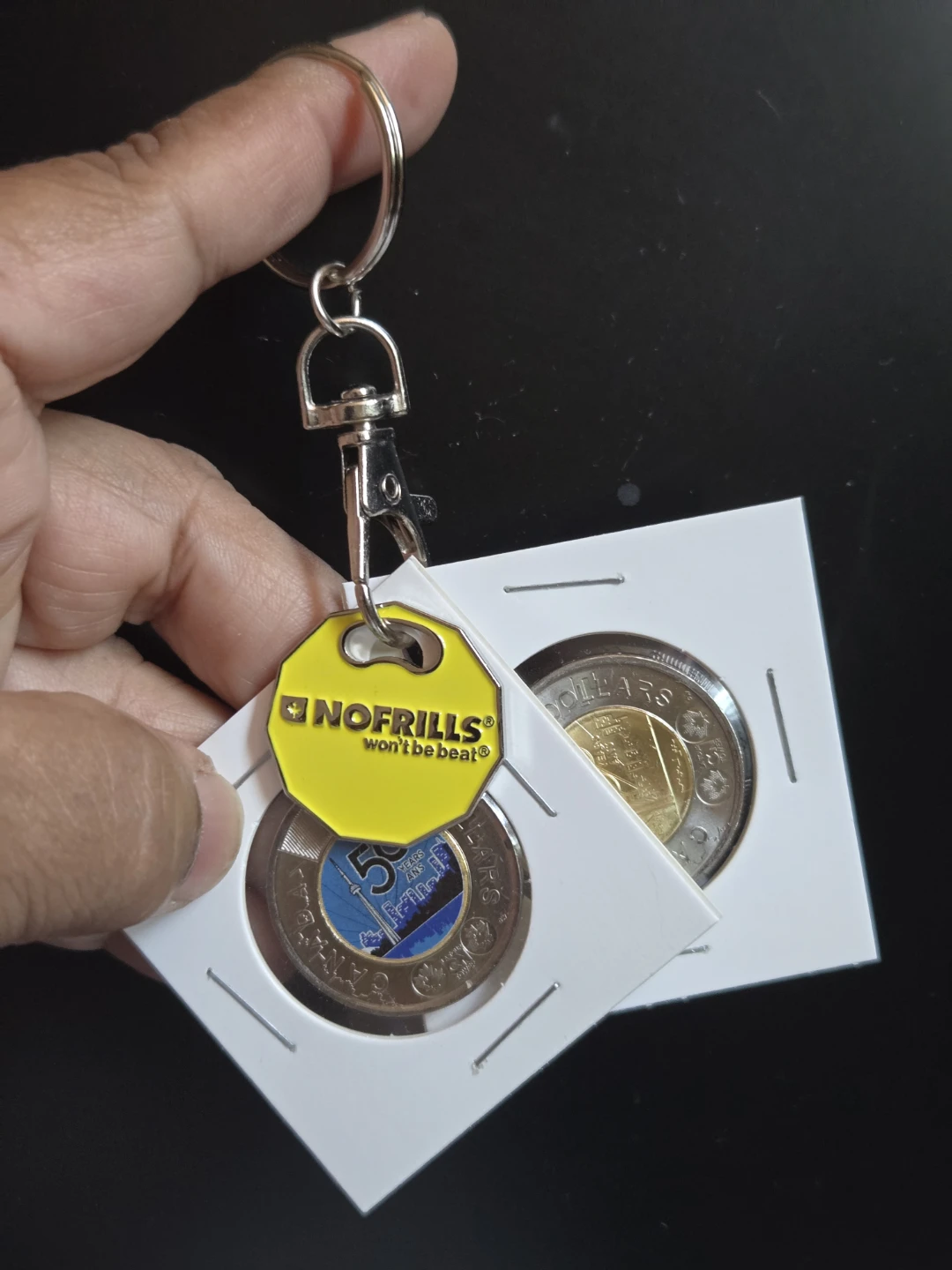 CN Tower & 50 Years Toonie in a keychain.