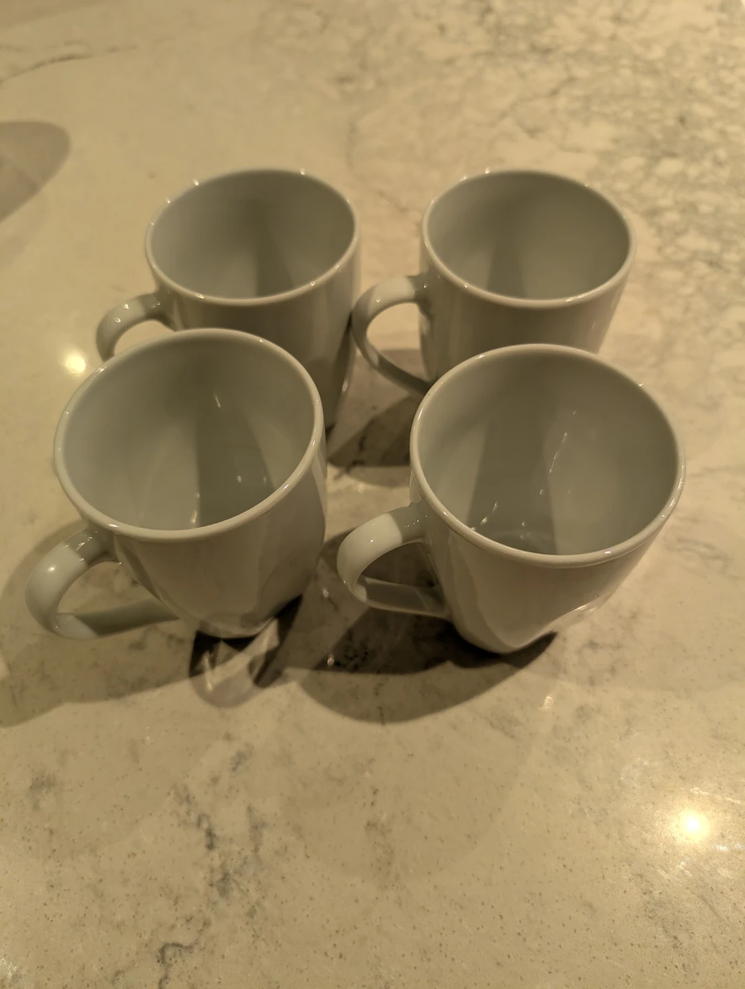 Set of 4 white KITCHEN STUFF PLUS mugs