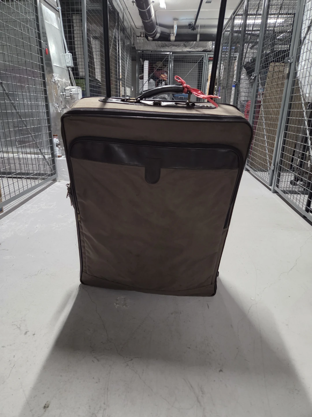Brown Rolling Suitcase