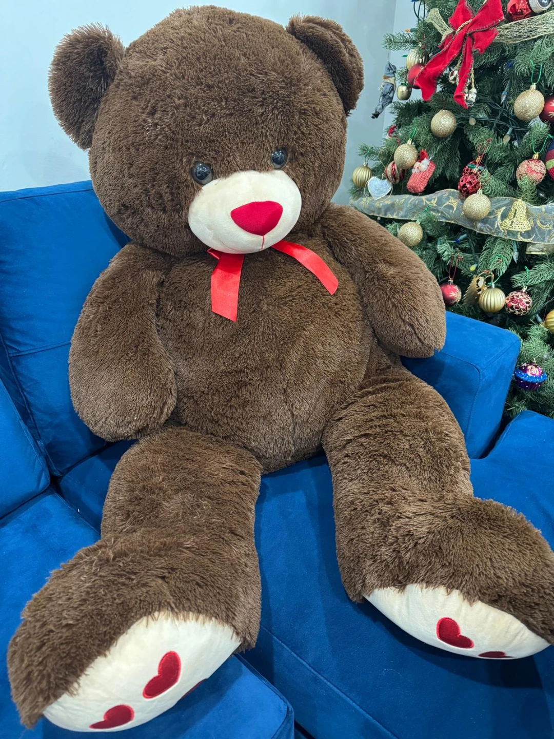 Giant Brown Teddy Bear with Red Bow