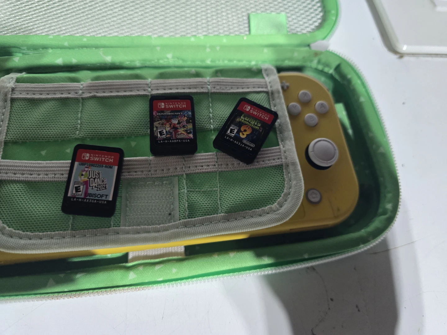 Nintendo Switch Lite Yellow - Used - photo 4