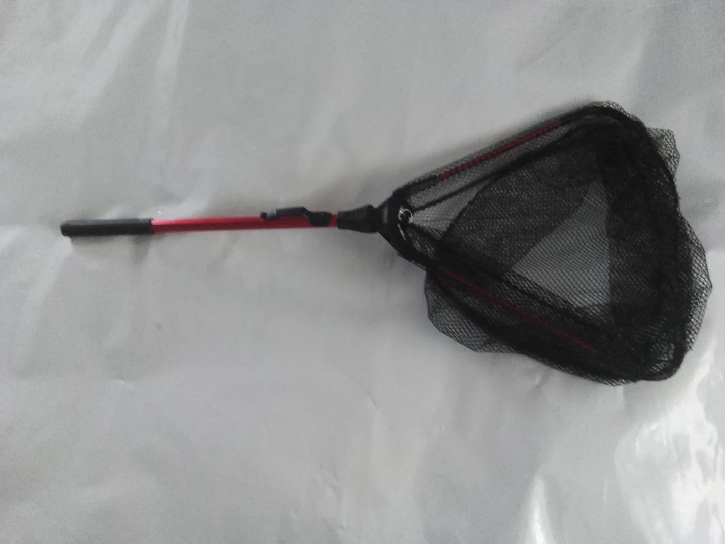 Fishing Net with Red Handle
