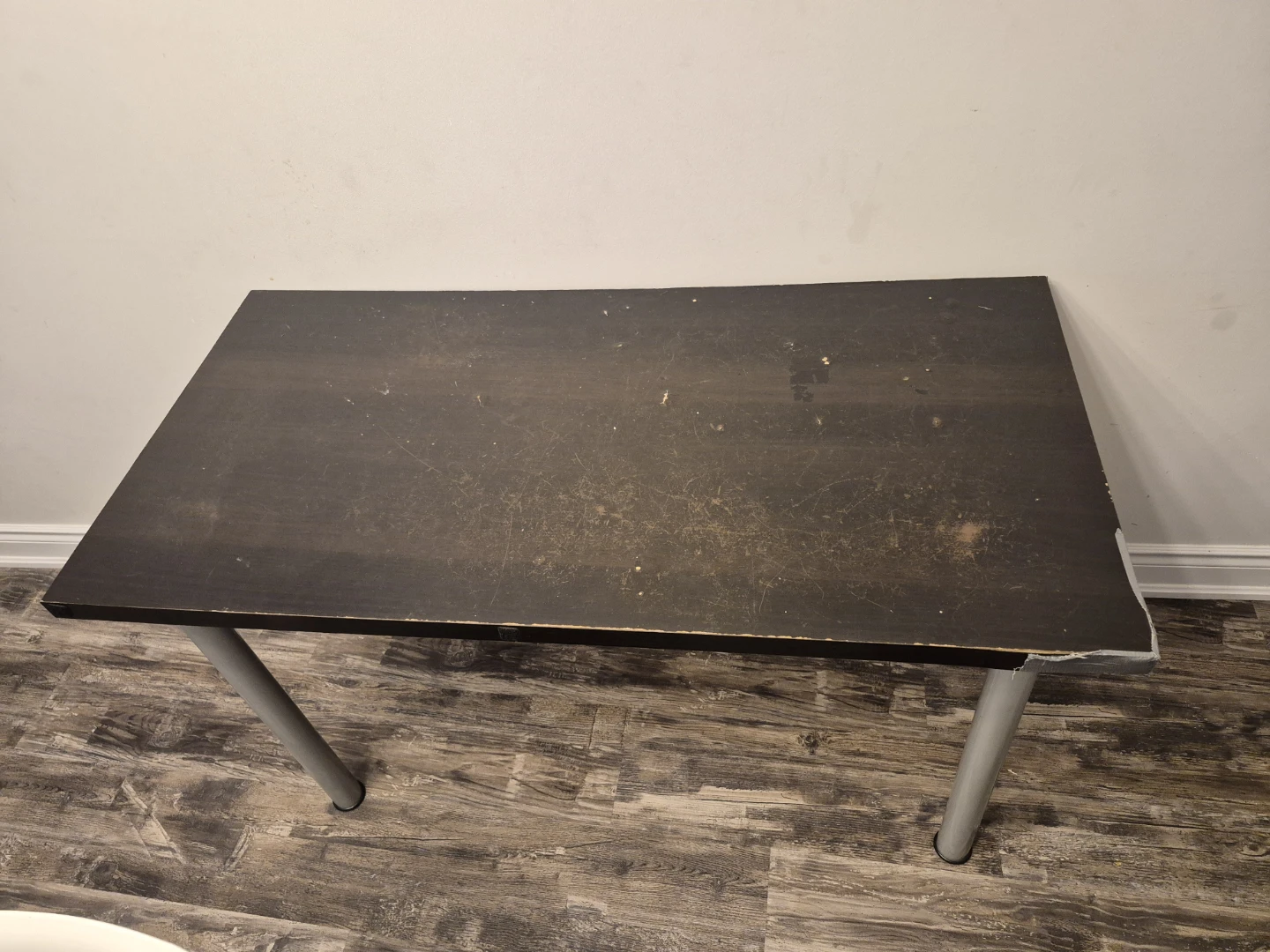 Dark brown desk with silver legs