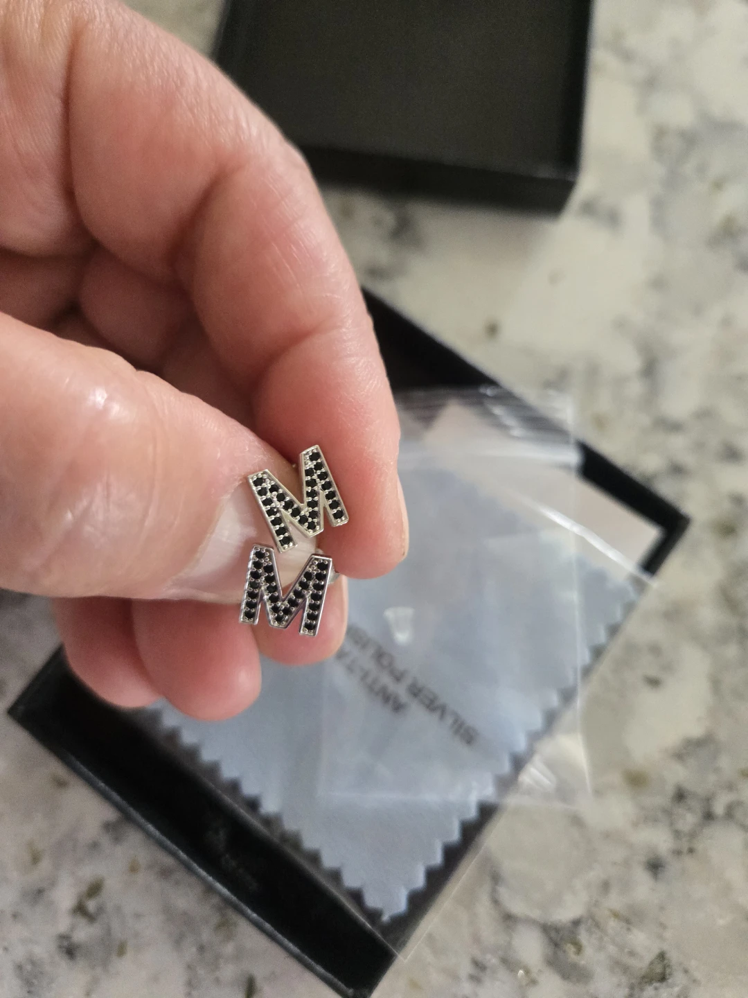 M Letter Stud Earrings with Black Stones