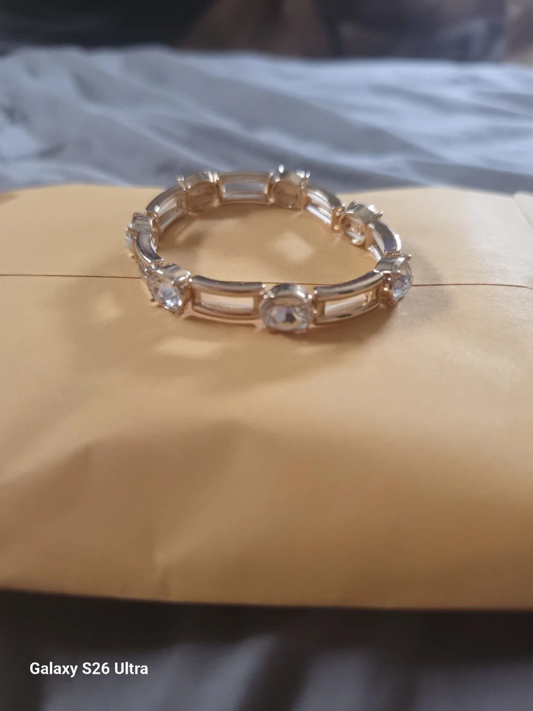 Gold-tone bracelet with clear stones