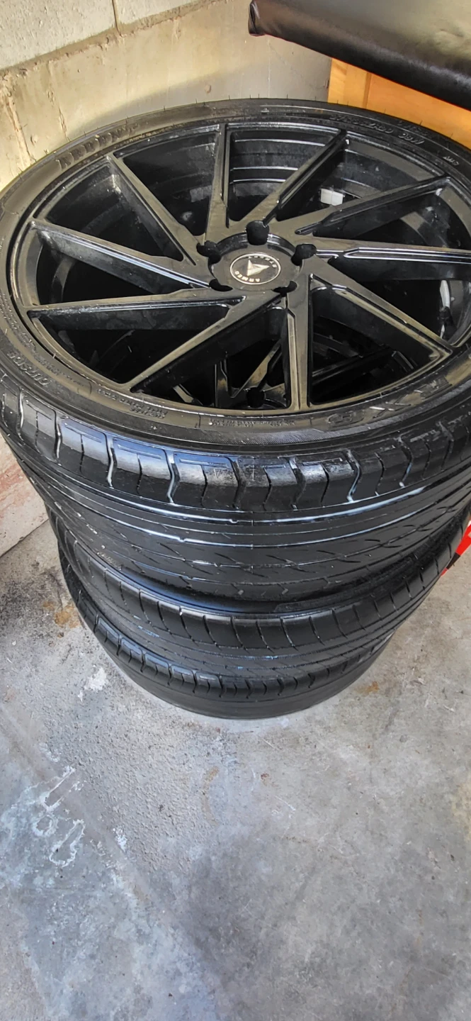 Set of 4 Black Rims and Tires - photo 4