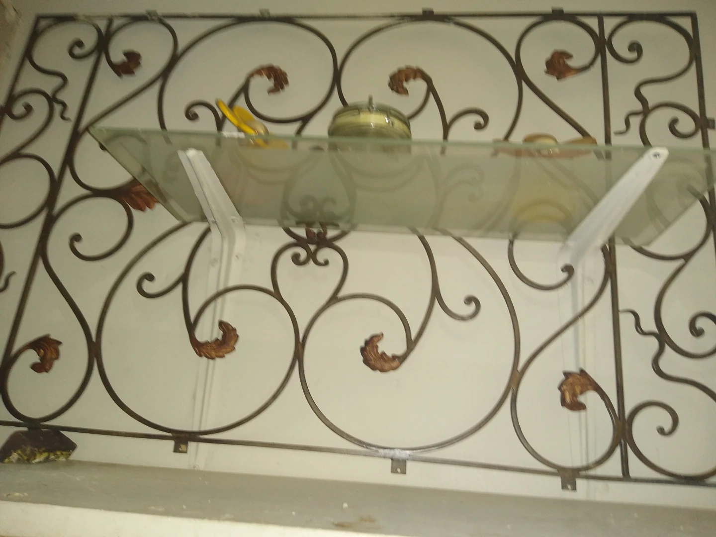 Ornate Antique wrought iron window grate