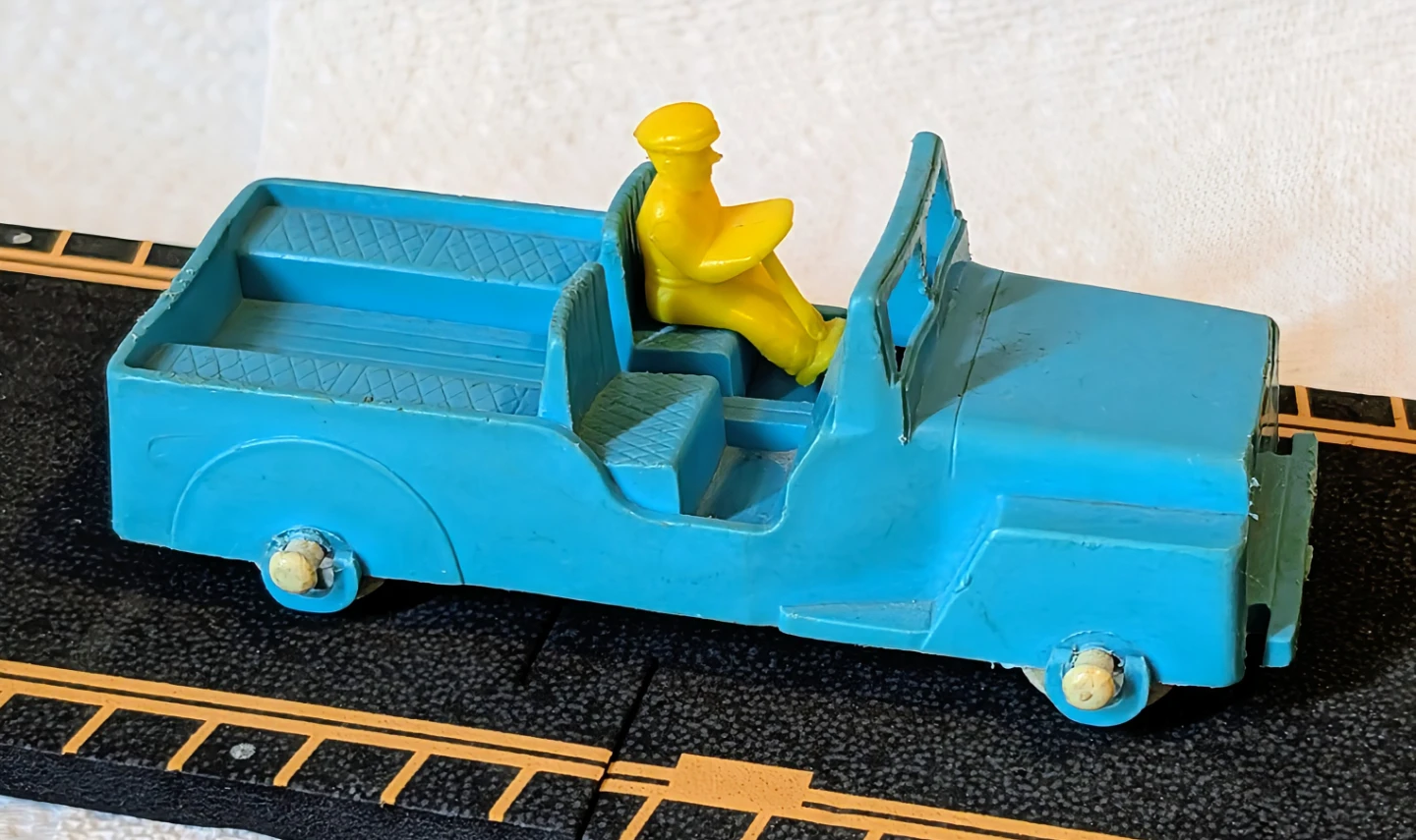 Vintage Blue Toy Jeep with Yellow Driver - Made in Canada