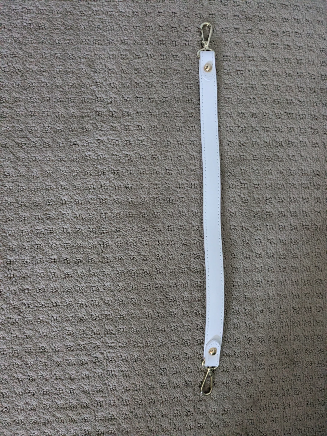 White real leather purse strap with gold clasp