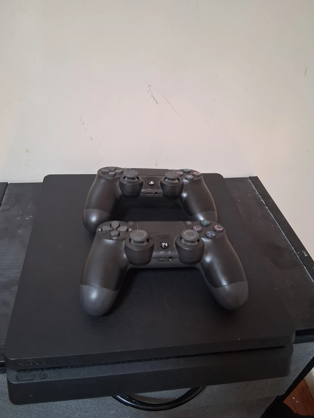 Sony PlayStation 4 Console with Two Controllers and Games