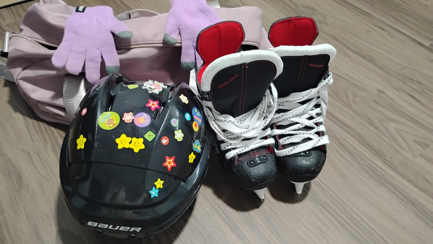 Selling kids’ ice skates and helmet.