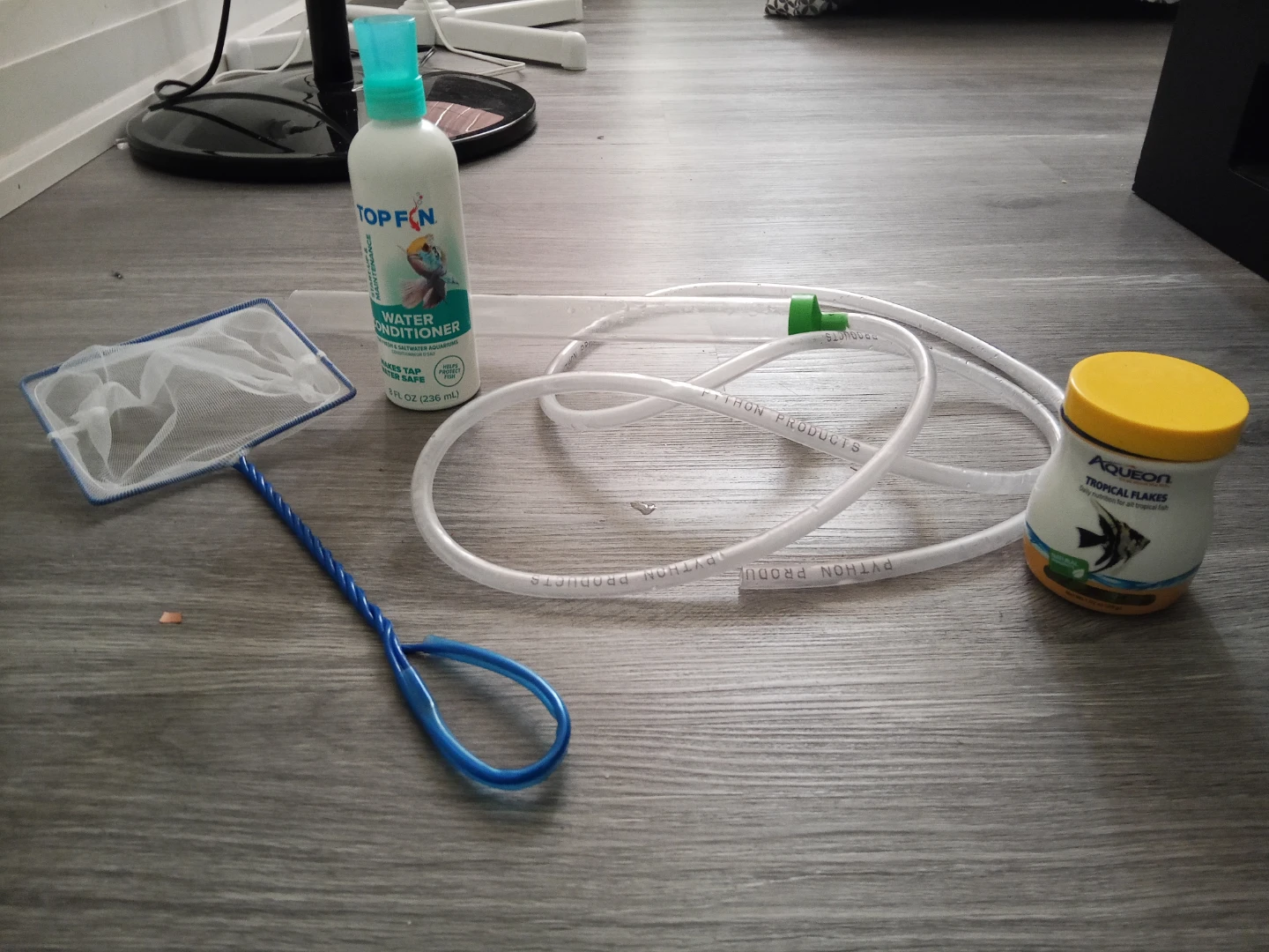 Aquarium Care Kit: Water Conditioner, Fish Food, Net & Siphon