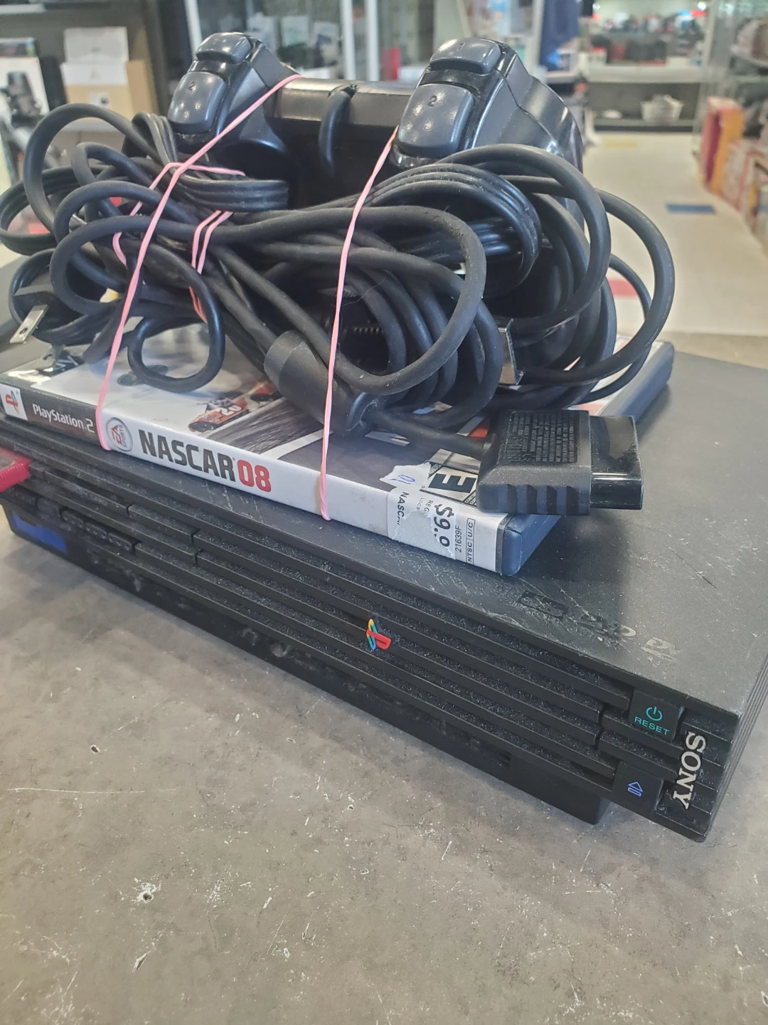 Sony PlayStation 2 Console with Controller and NASCAR 08 Game