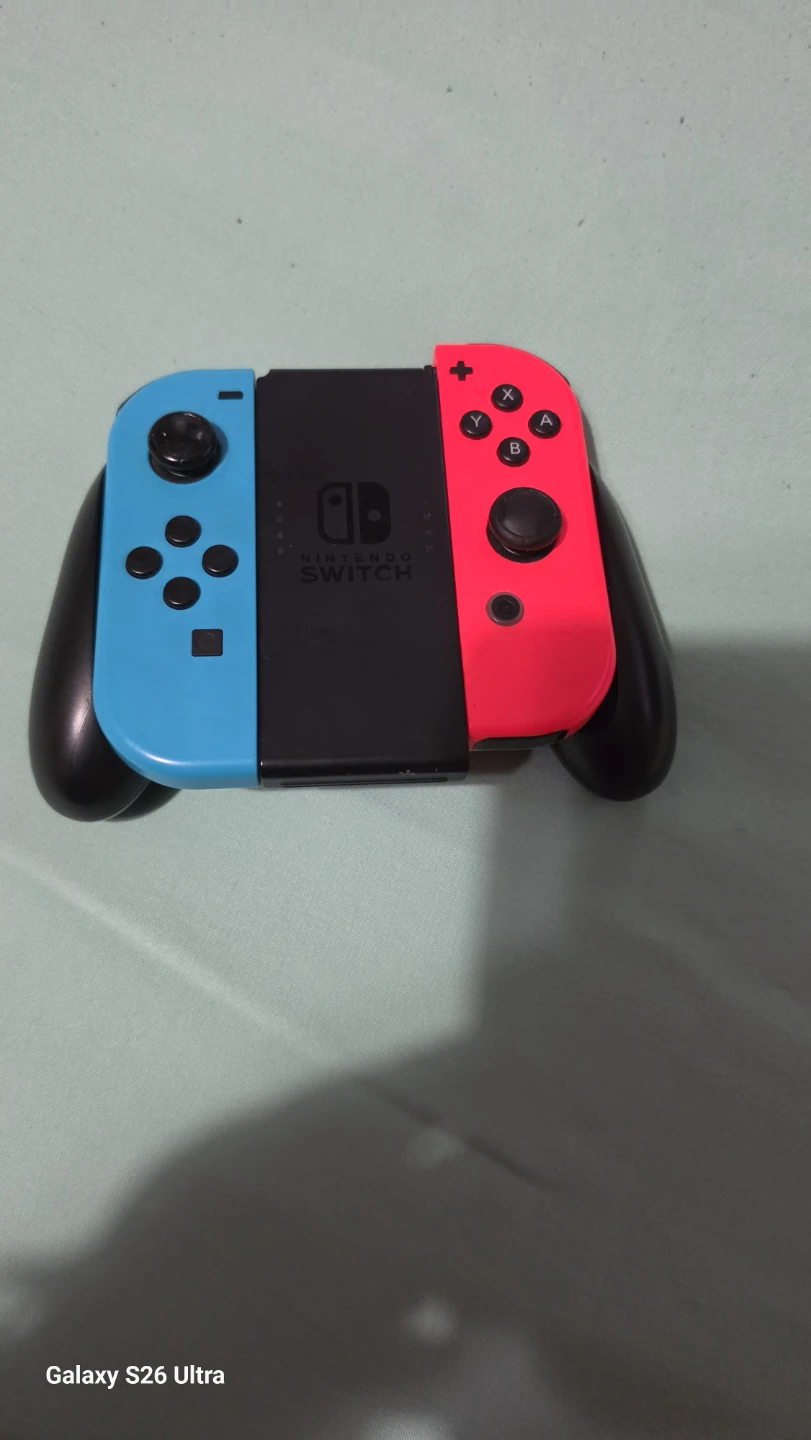 Nintendo Switch Console with Neon Red and Blue Joy-Cons
