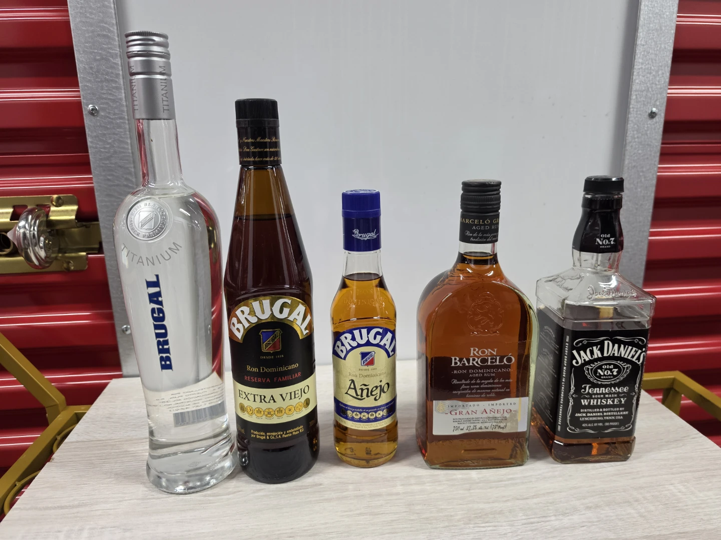 Assorted Liquor Bottles: Brugal, Ron Barcelo, Jack Daniels