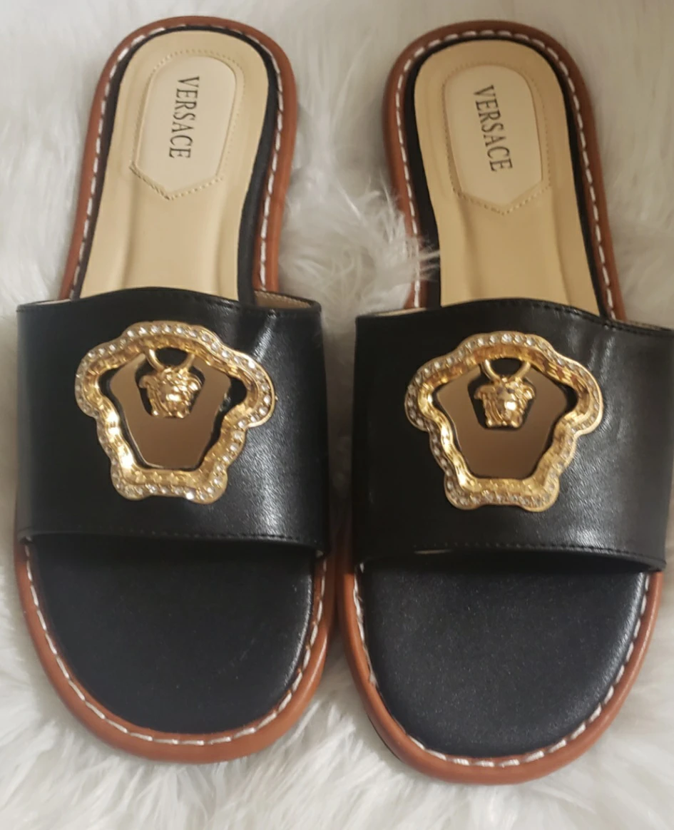 Brand new Versace Black Slides with Medusa Head