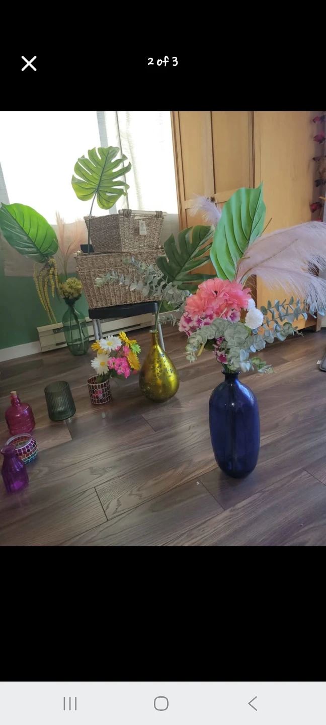 Assorted Decorative Vases and Small Flower Arrangements