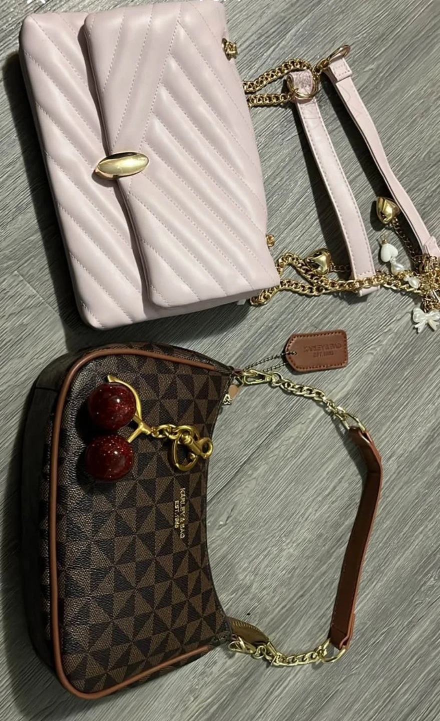 Both 50 2 handbag with one cherry keychain