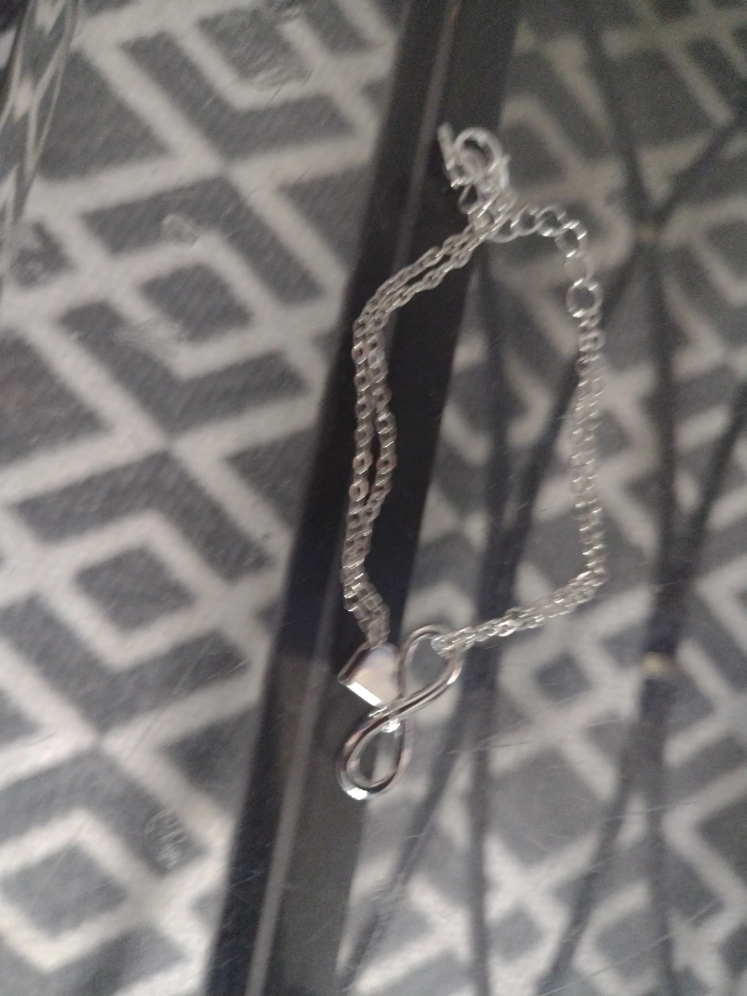 Silver tone infinity Bracelet with heart charm
