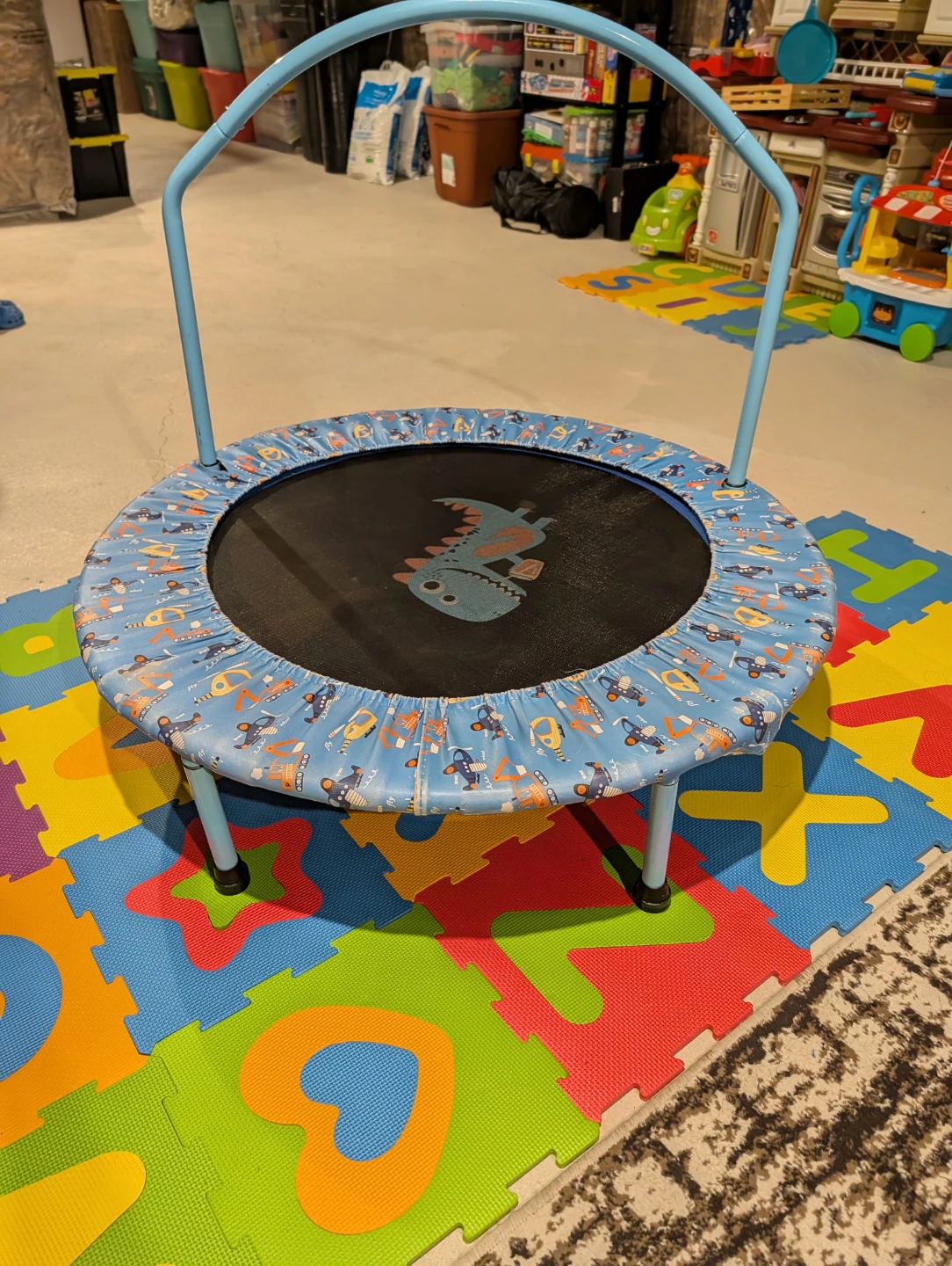 Blue Kids Trampoline with Dinosaur and Vehicle Print