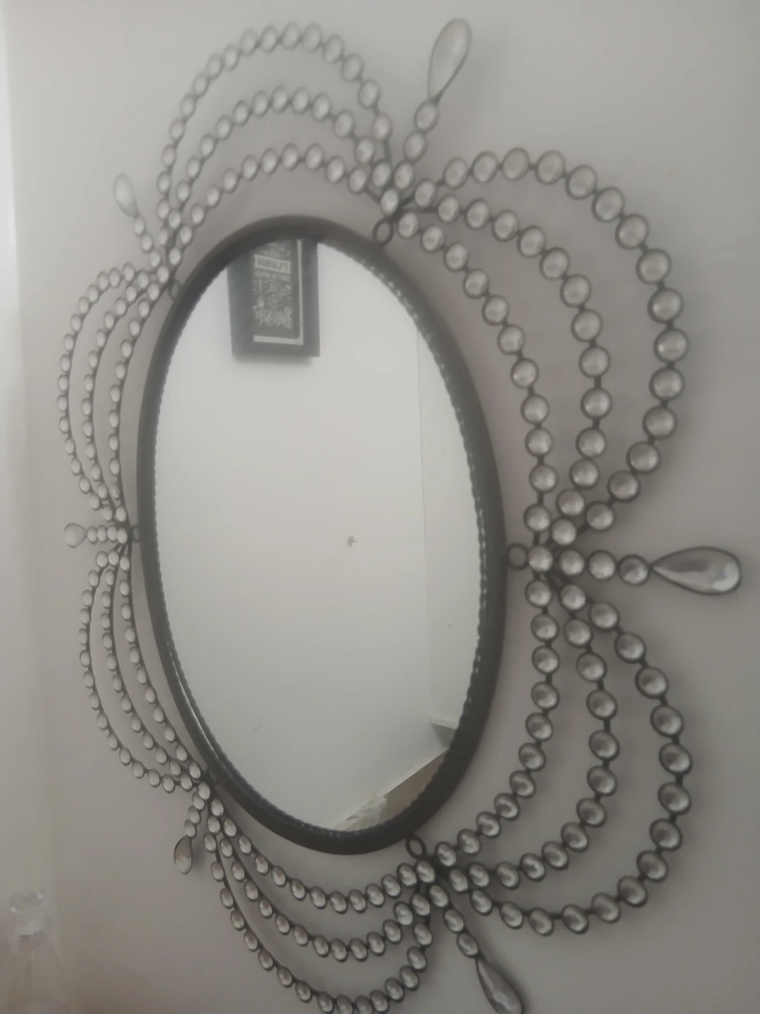 Oval decorative mirror with beaded and crystal accents