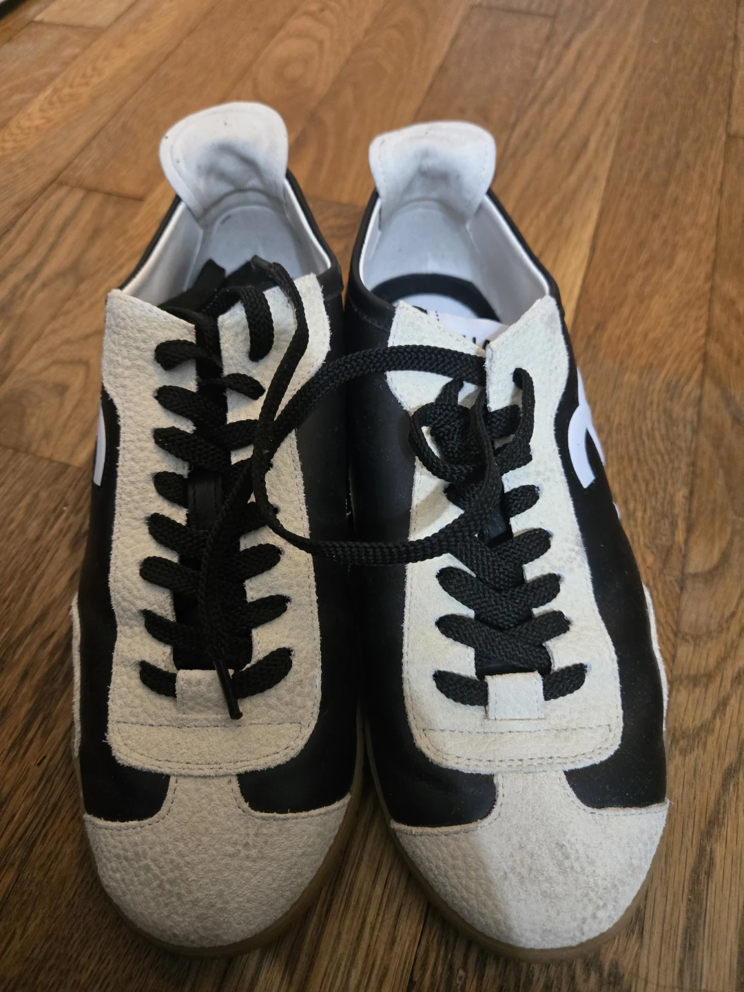 CHANEL Black & White Leather Sneakers - photo 2