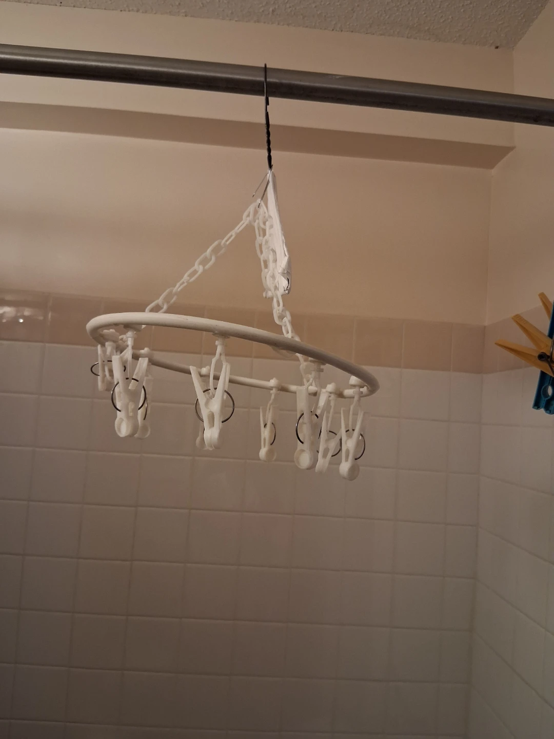 White plastic drying hanger with clips  Pending