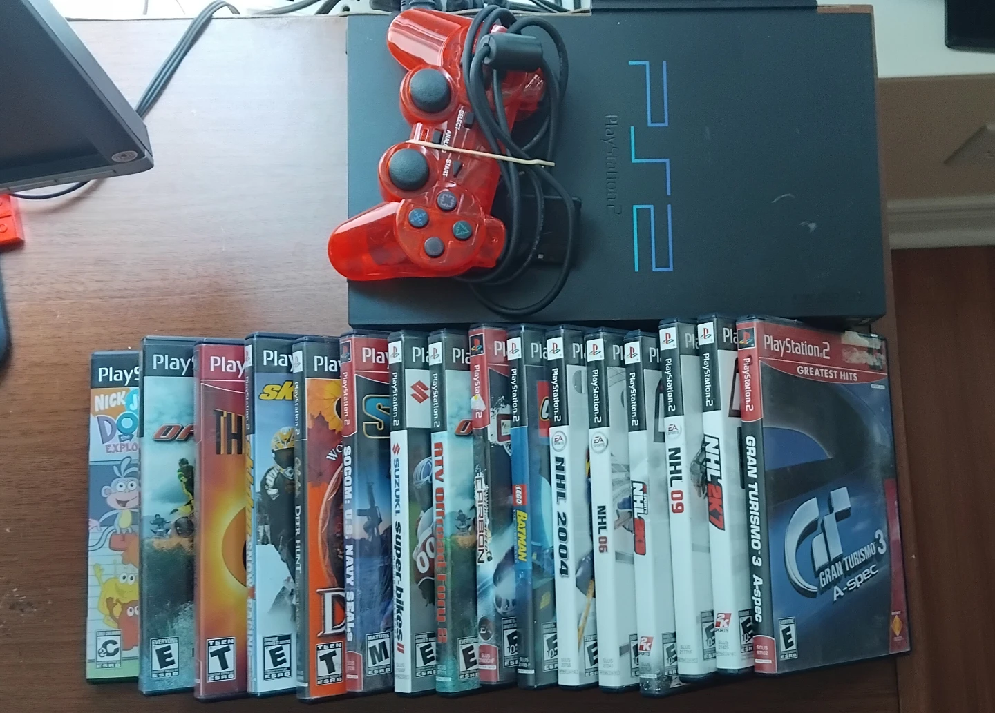 PlayStation 2 Console with Controller and Games
