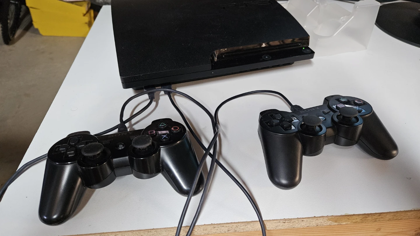Sony PlayStation 3 Console with 2 Controllers - photo 4