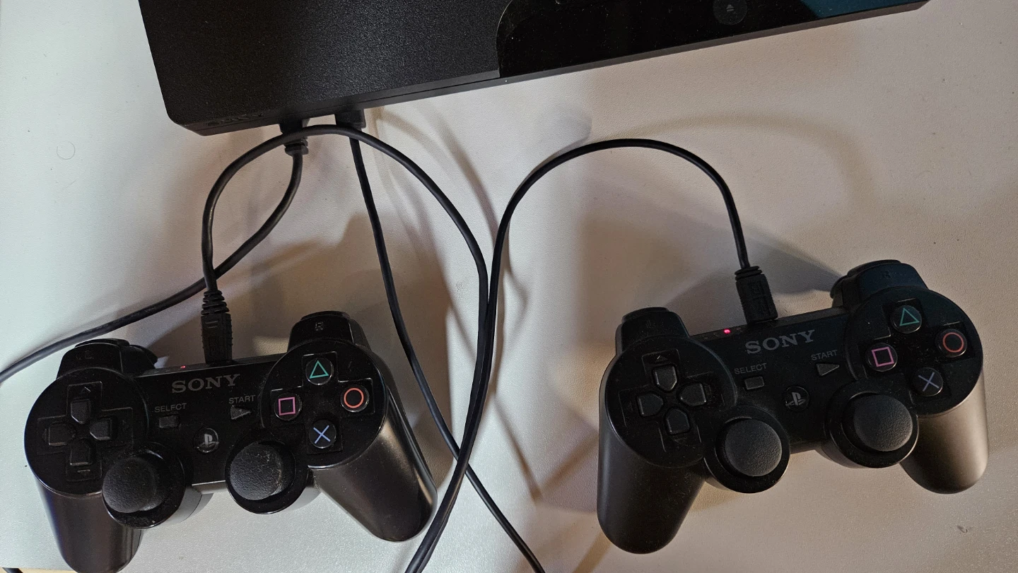 Sony PlayStation 3 Console with 2 Controllers - photo 5