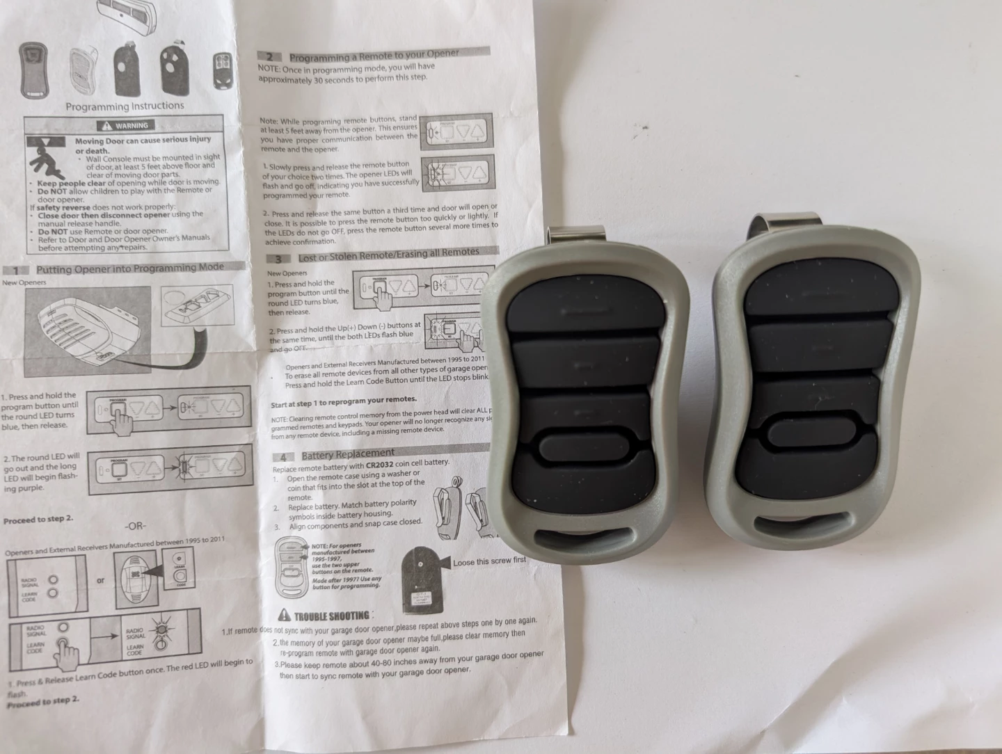 Brand New Pair of Remote Garage Door Openers for Genie Brand