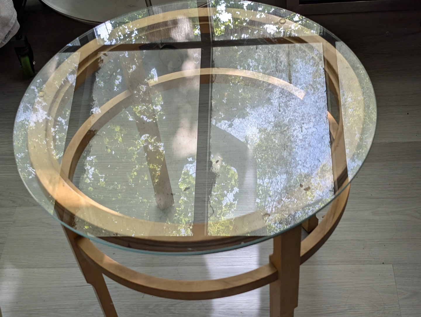 Pair of glass-top wooden base tables