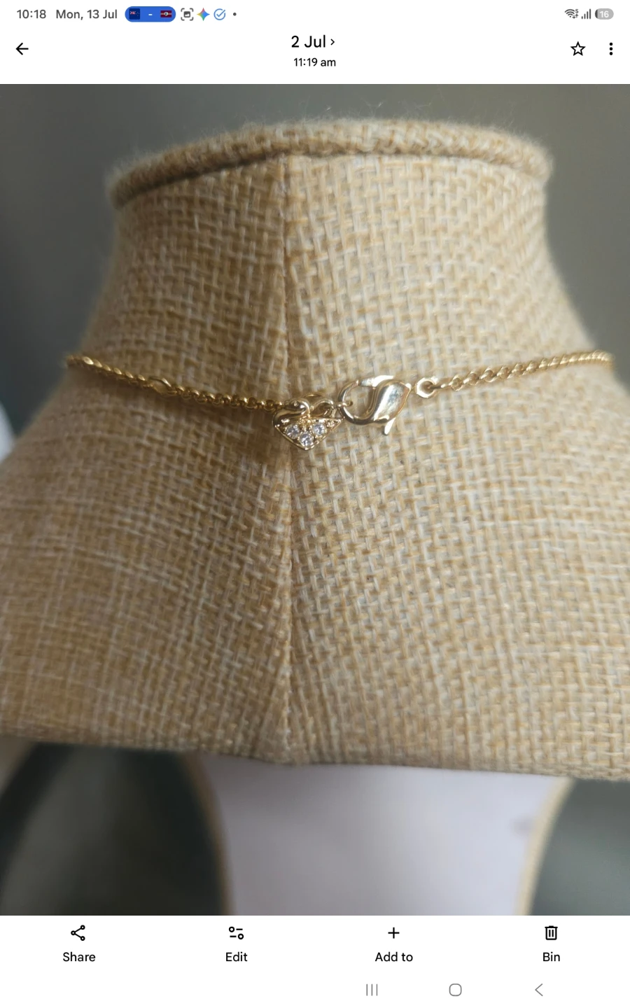 Gold-tone necklace with decorative charms - photo 3
