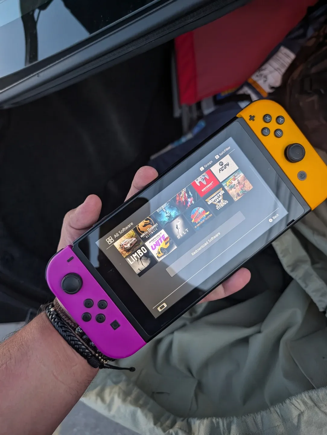 Nintendo Switch 1 Console with Purple and Yellow Joy-Cons - photo 4