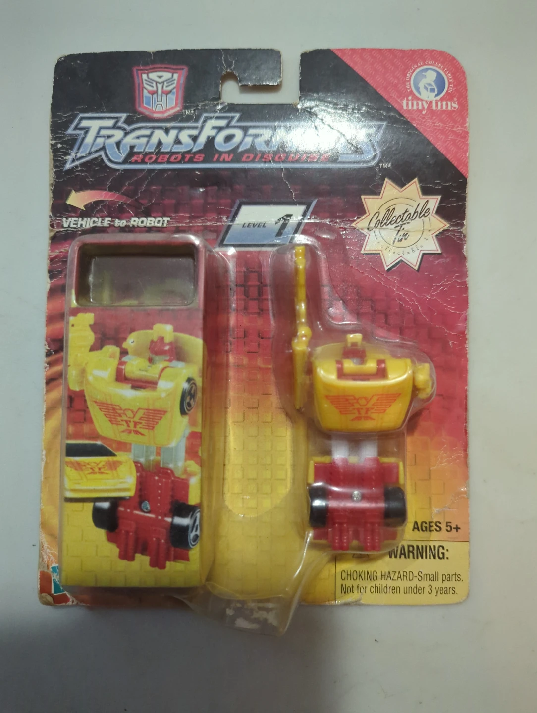 Transformers Tiny Tins Robot in Disguise - Autobot Hot Shot