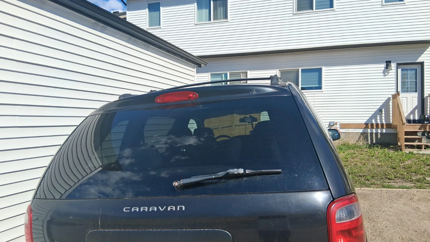 Black Dodge Caravan Minivan - photo 2