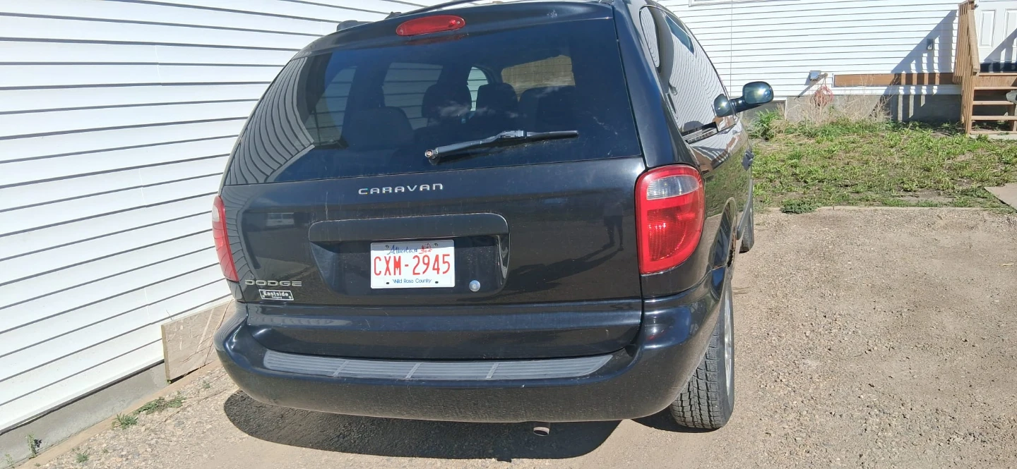Black Dodge Caravan Minivan - photo 5