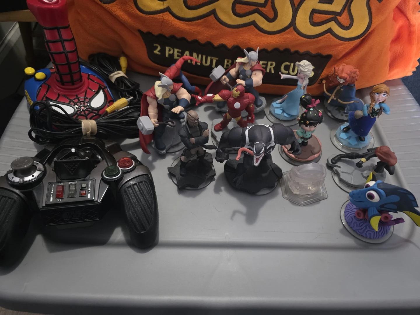 Disney Infinity Figures and Video Game Controllers