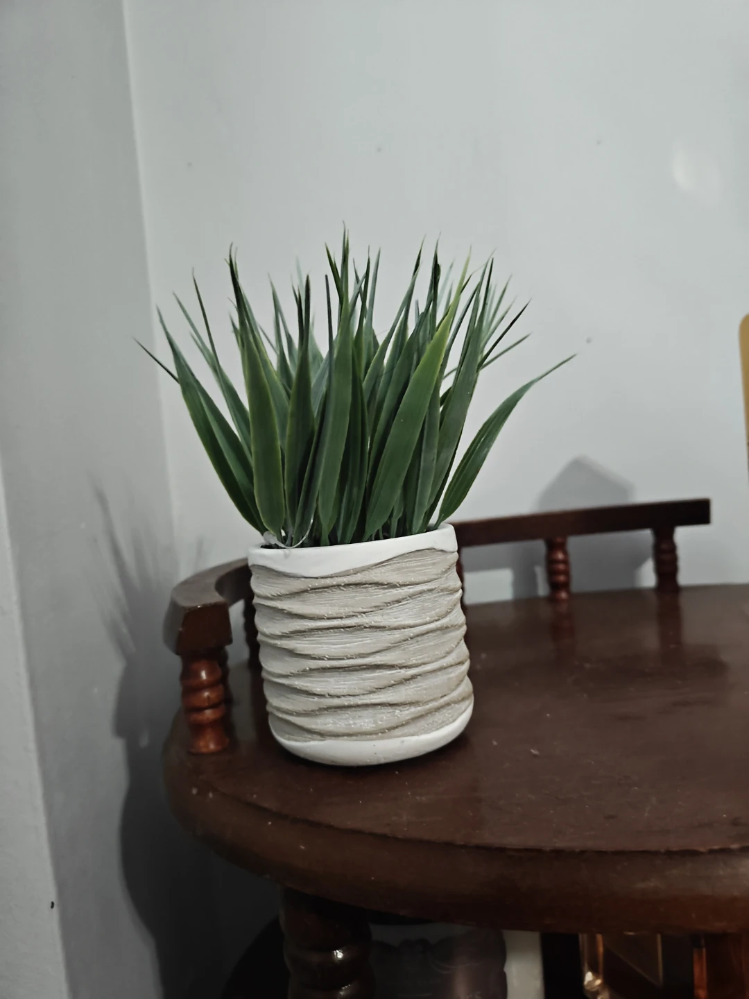 Artificial Grass Plant in White Textured Pot