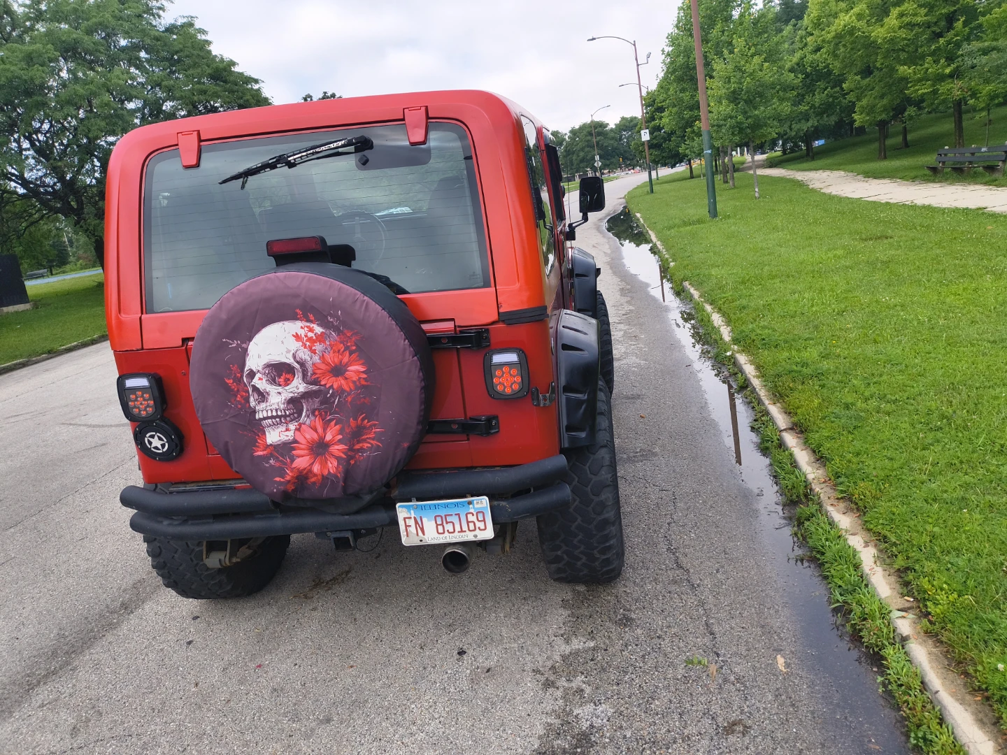 Red Jeep Wrangler with Custom Spare Tire Cover - photo 3