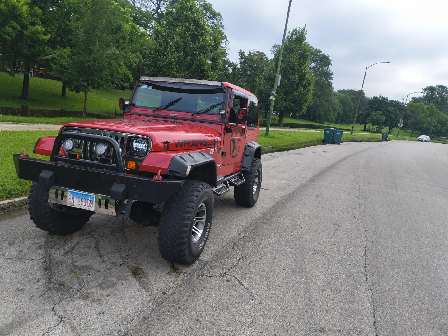 Red Jeep Wrangler with Custom Spare Tire Cover - photo 4
