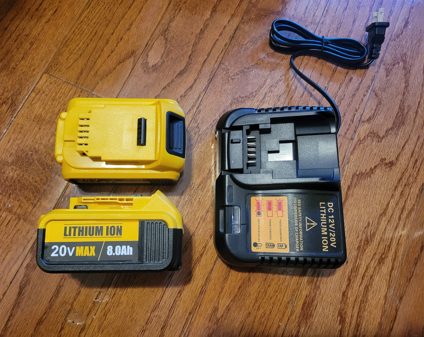 Two Batteries 8.0Ah each and a Charger Set for DeWalt