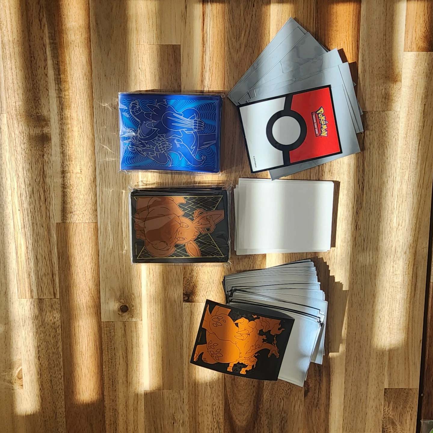 Pokemon Card Sleeves and Playmat Bundle