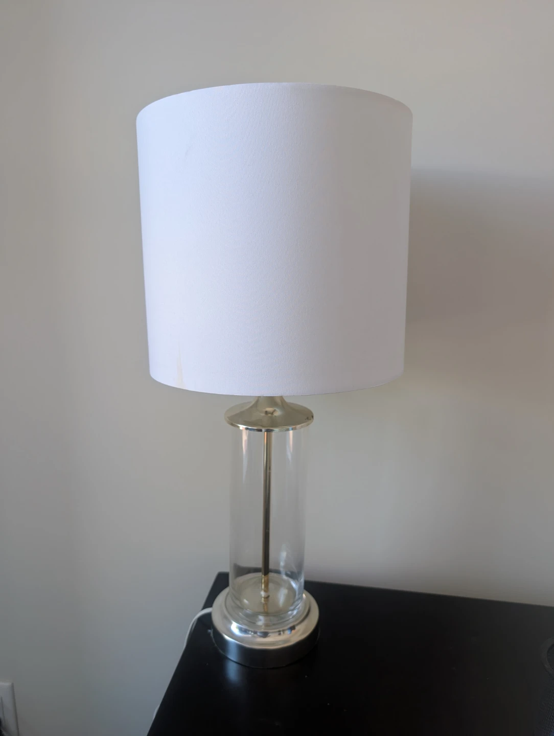 Glass cylinder table lamp with white shade