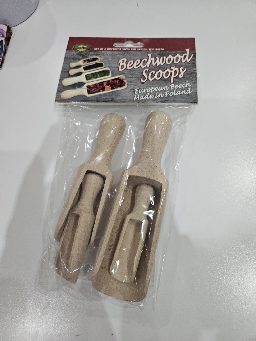 Set of four beechwood scoops
