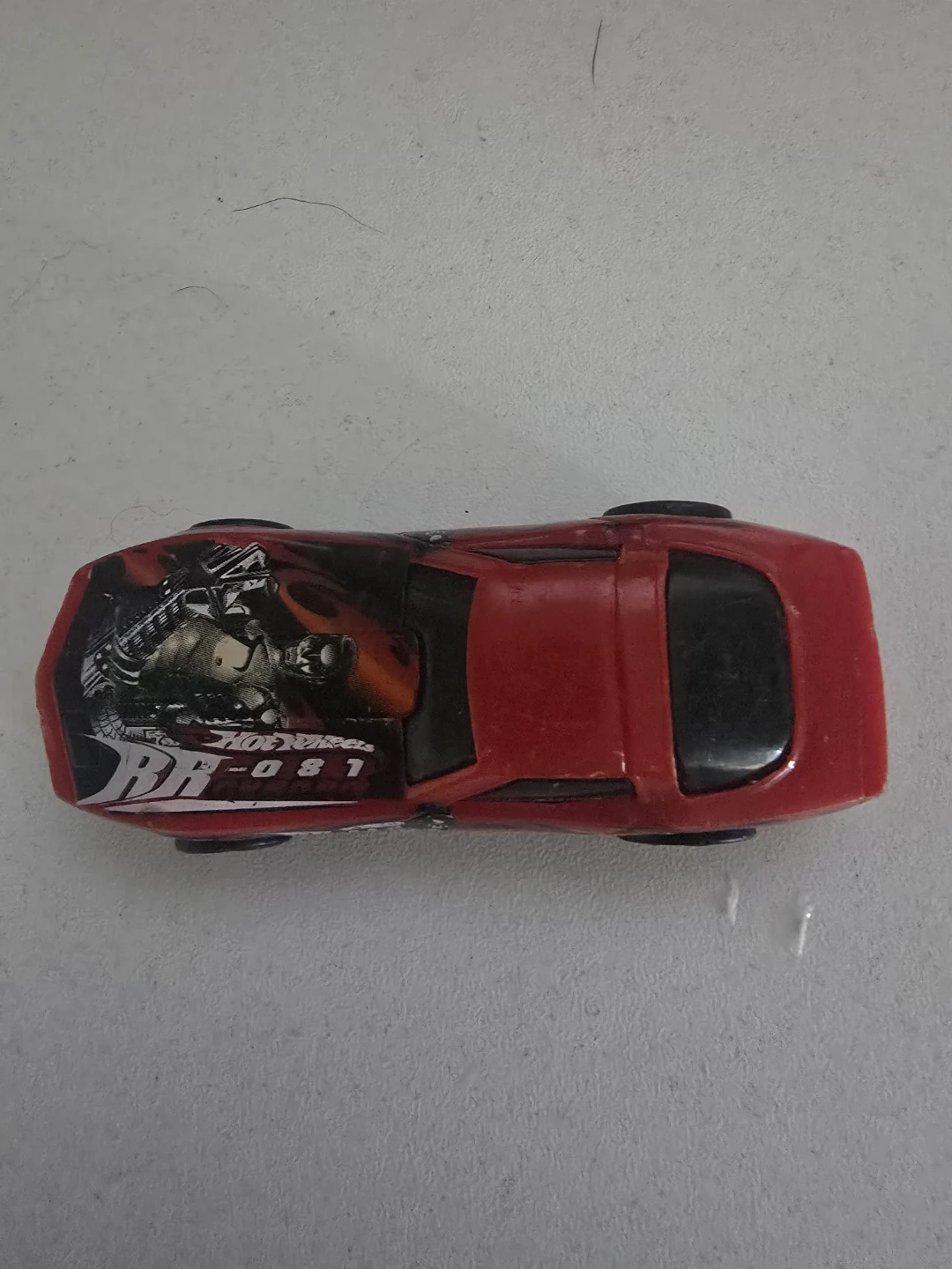 Red Toy Car with Graphic Design
