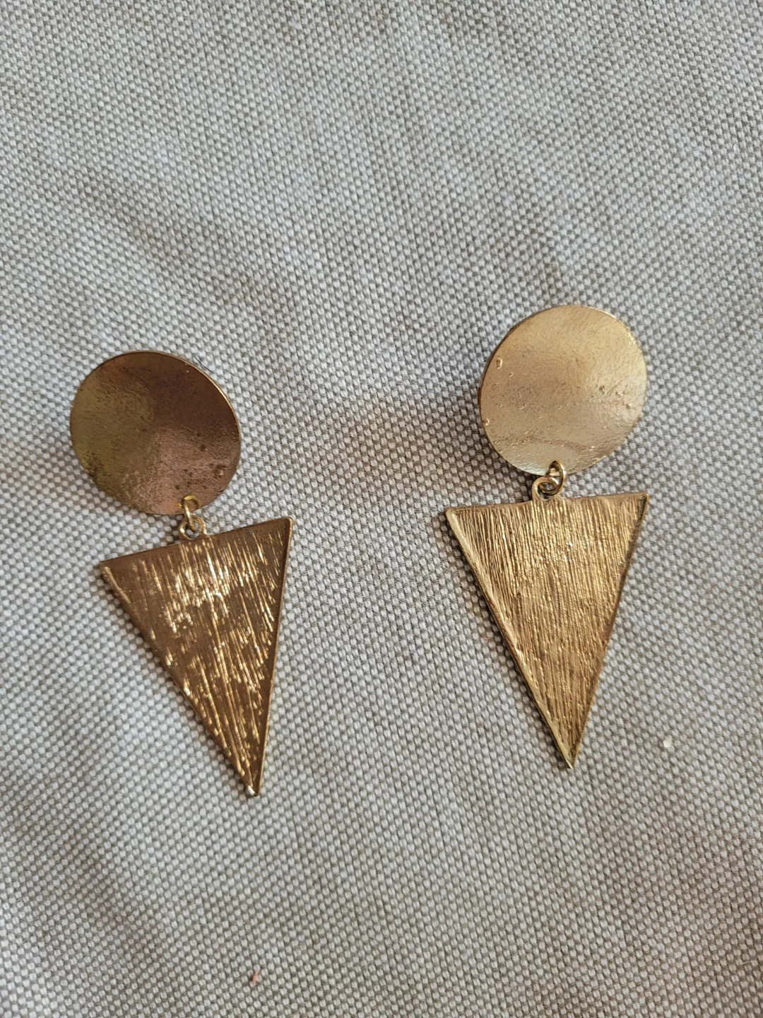 Gold tone dangle earrings