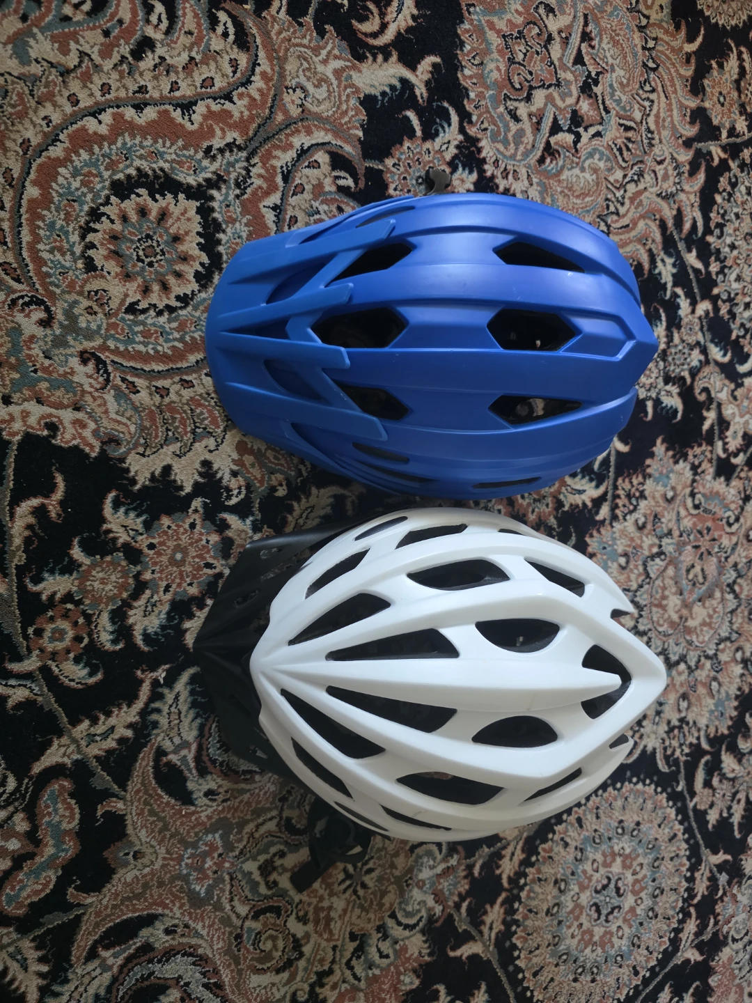 Two Bicycle Helmets - Blue and White