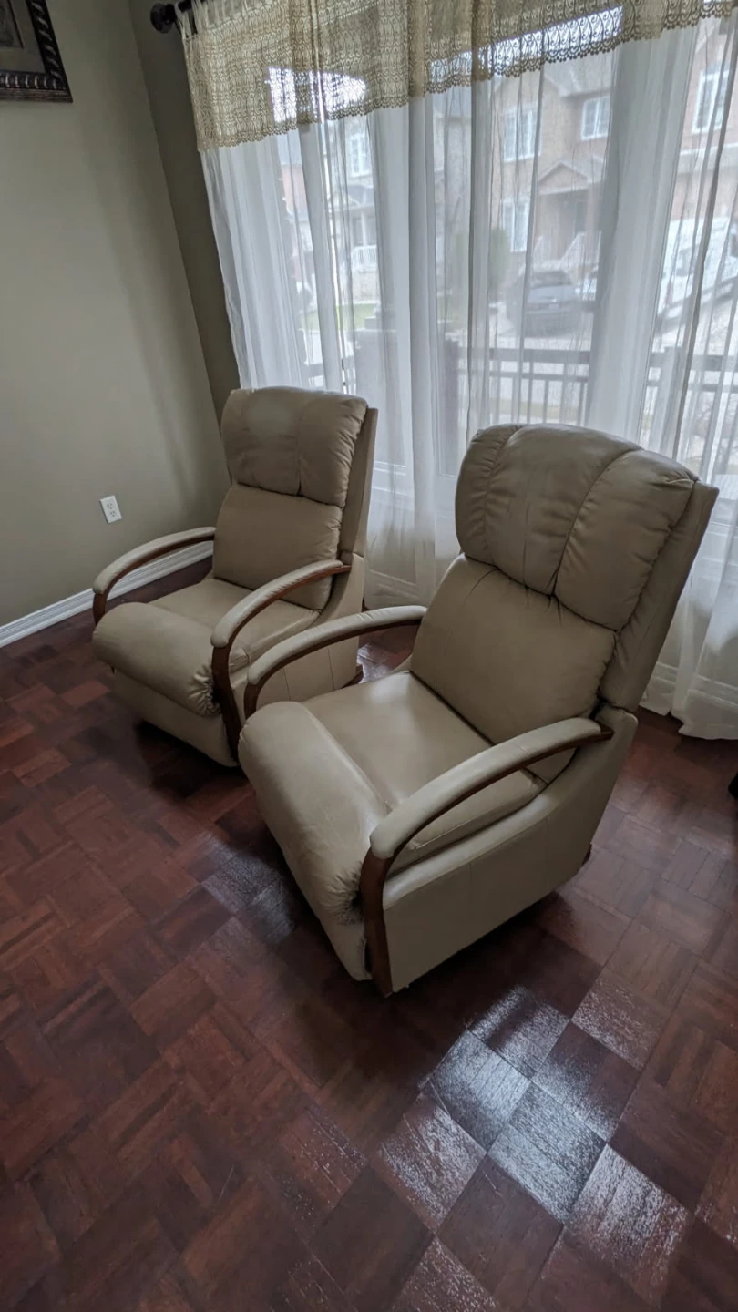 Pair of beige reclining chairs