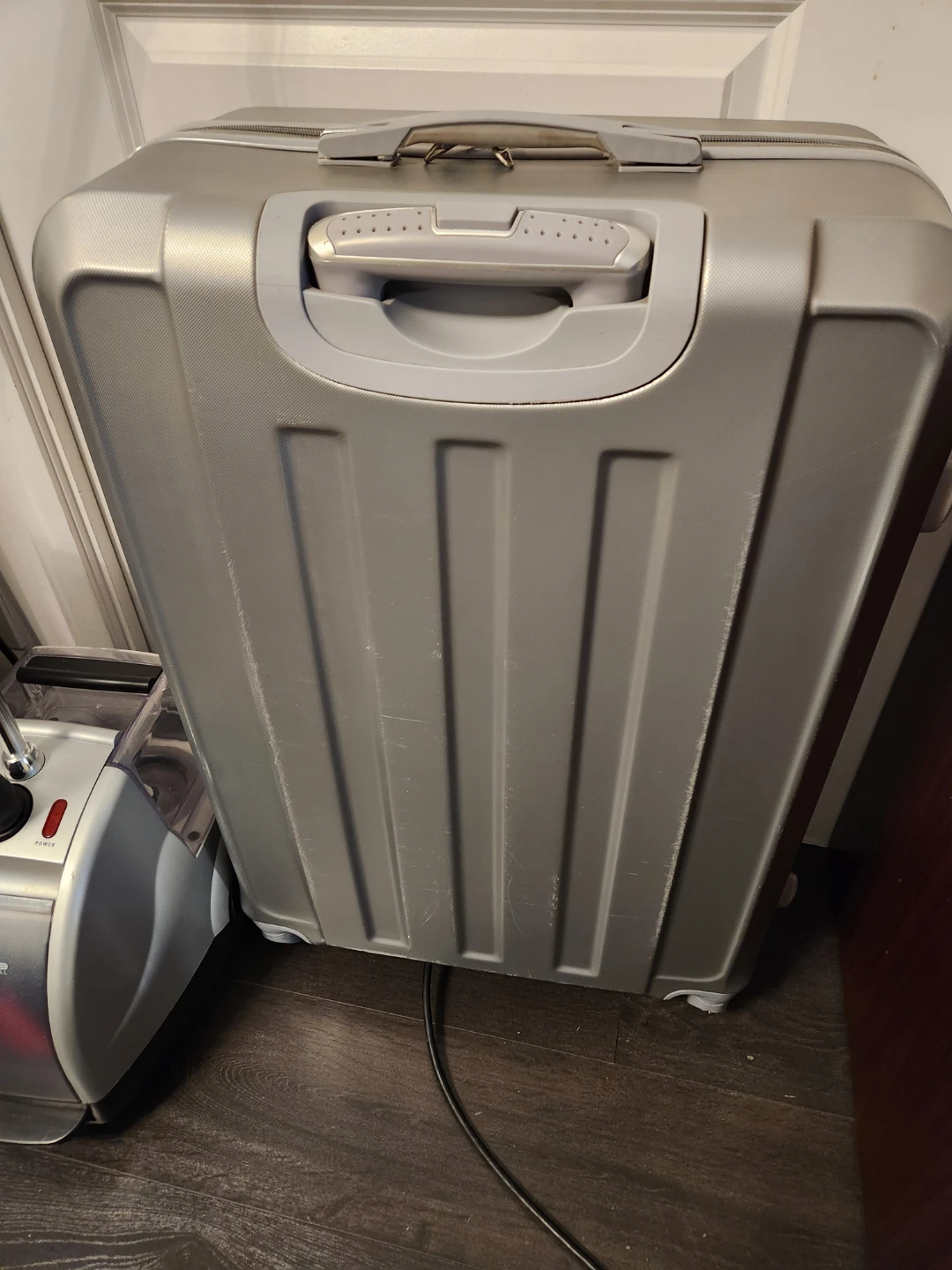 Silver Hard-shell Rolling Suitcase